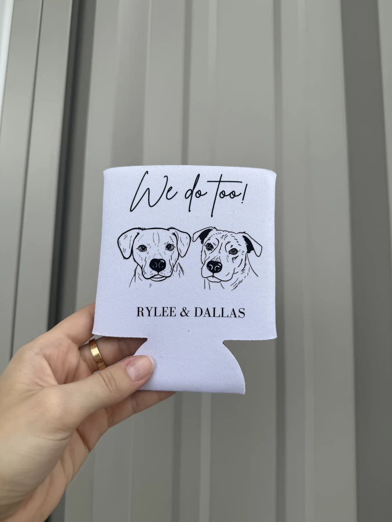 White custom wedding koozie with two illustrated dogs